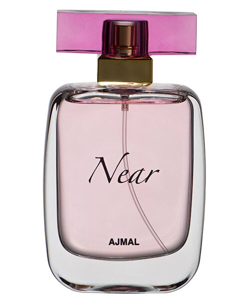 Near Ajmal perfume bottle